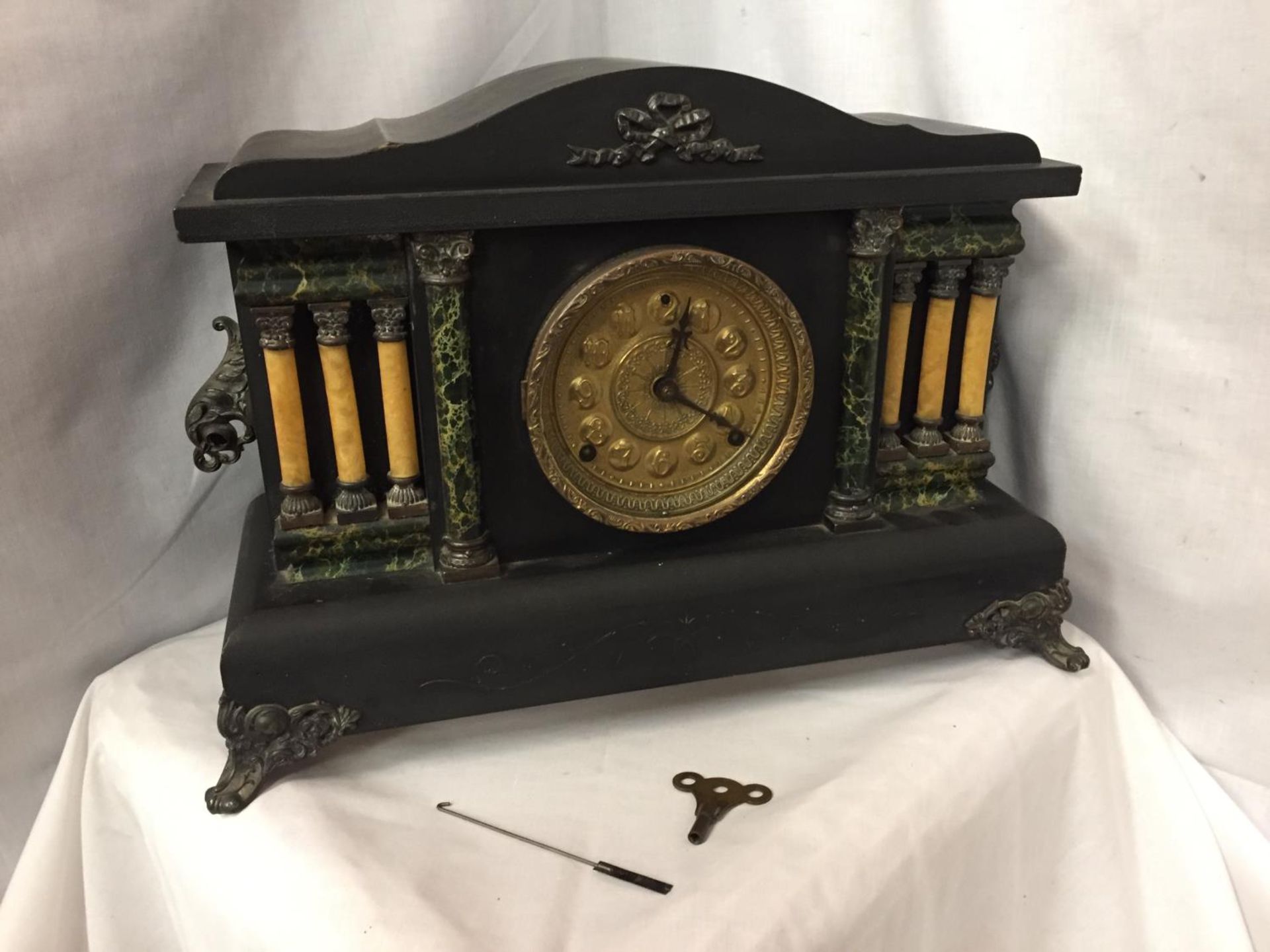 A VICTORIAN EIGHT DAY CATHEDRAL GONG EBONISED MANTEL CLOCK BY THE SESSIONS CLOCK CO.