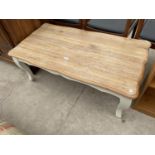 A MODERN OAK COFFEE TABLE ON PAINTED BASE, 45X23"