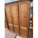 A MODERN THREE DOOR WARDROBE, 58" WIDE, BEARING RELYON LABEL