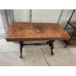 A VICTORIAN WALNUT TWIN PEDESTAL LOW TABLE WITH TURNED CENTRE STRETCHER, 42X21"