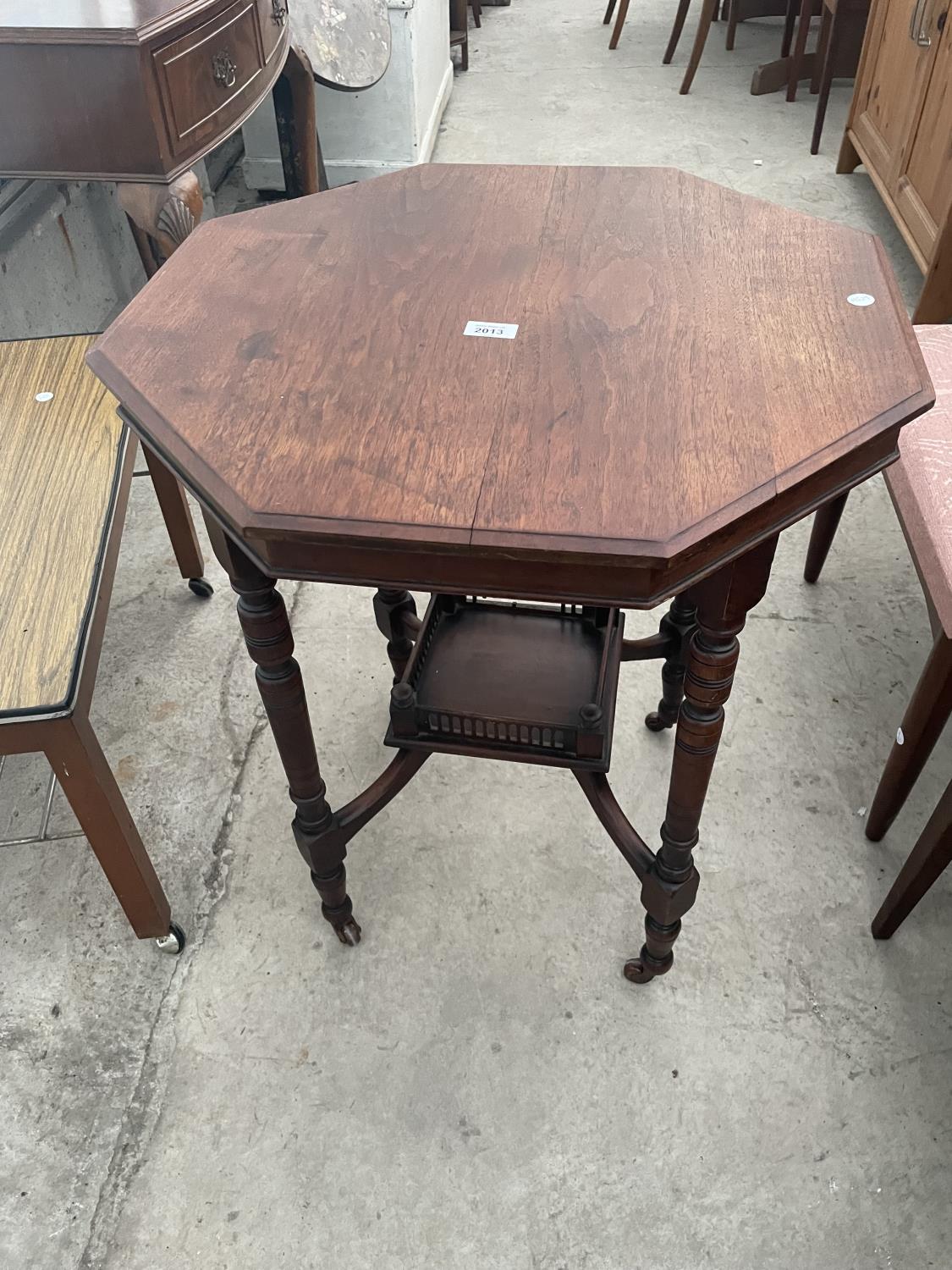 A LATE VICTORIAN OCTAGONAL TWO TIER CENTRE TABLE, 26" MAX