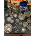 A LARGE COLLECTION OF SILVER PLATED ITEMS TO INCLUDE COFFEE POTS, CANDLE STICK, EGG CUPS ETC