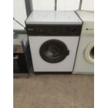 A WHITE HOTPOINT TUMBLE DRYER BELIEVED IN WORKING ORDER BUT NO WARRANTY