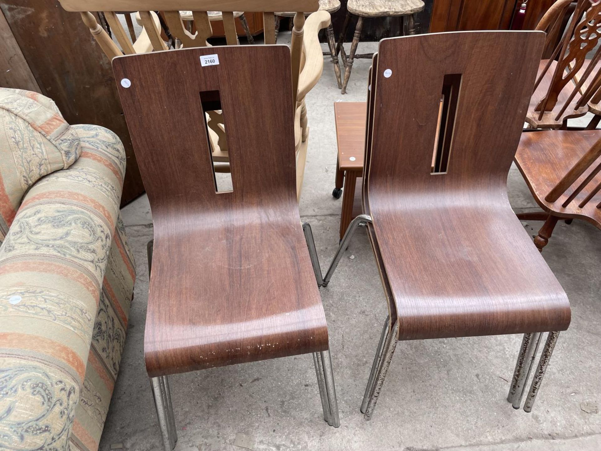 A SET OF SIX BENTWOOD STACKING CHAIRS, ON TUBULAR CHROME FRAME