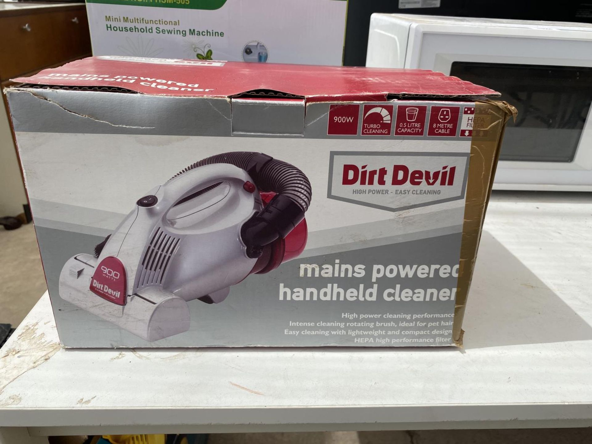 A DIRT DEVIL VACUUM CLEANER AND A FURTHER SEWING MACHINE - Image 2 of 3