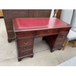 A MAHOGANY NINE DRAWER PEDESTAL DESK, 48X24"