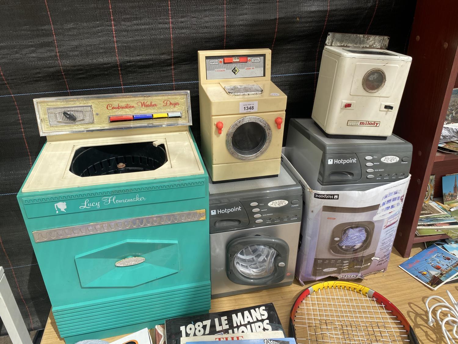 AN ASSORTMENT OF CHILDRENS TOYS TO INCLUDE WASHING MACHINES ETC