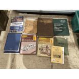 AN ASSORTMENT OF CAR MANUALS TO INCLUDE HAYNES AND TRIUMPH ETC