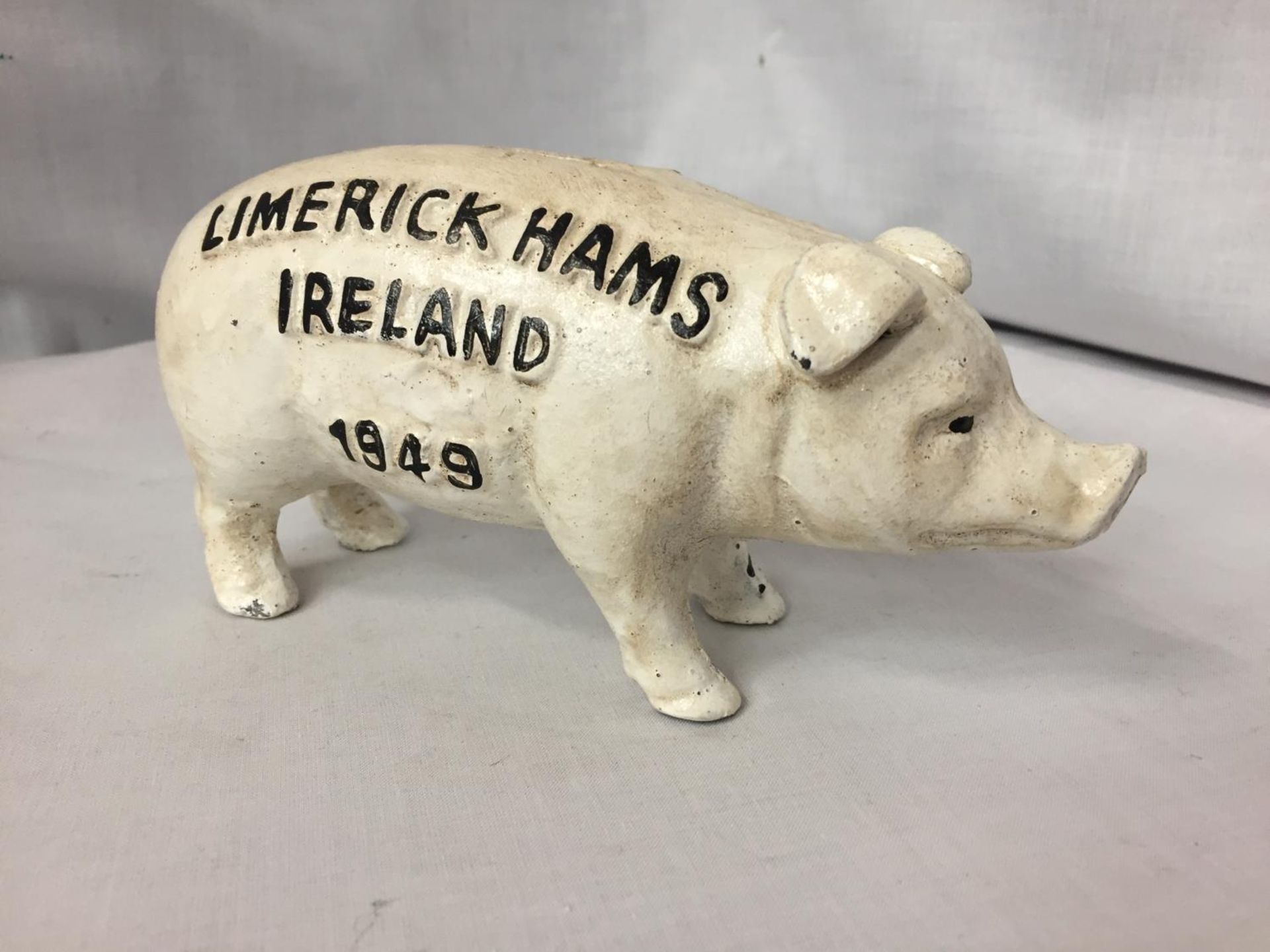 A CAST IRON BUTCHERS PIG - LIMERICK HAMS IRELAND