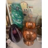 TWO CLEAR AND COPPER GLASS CANDLE HOLDERS AND TWO GLASS VASES