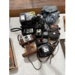 AN ASSORTMENT OF PHOTOGRAPHY EQUIPMENT TO INCLUDE CAMERAS ETC