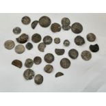 A QUANTITY OF COINS AND PART COINS, POSSIBLY INCLUDING EARLY HAMMERED EXAMPLES