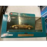 A BOXED CORGI GOLD PLATED E TYPE JAGUAR SOFT TOP