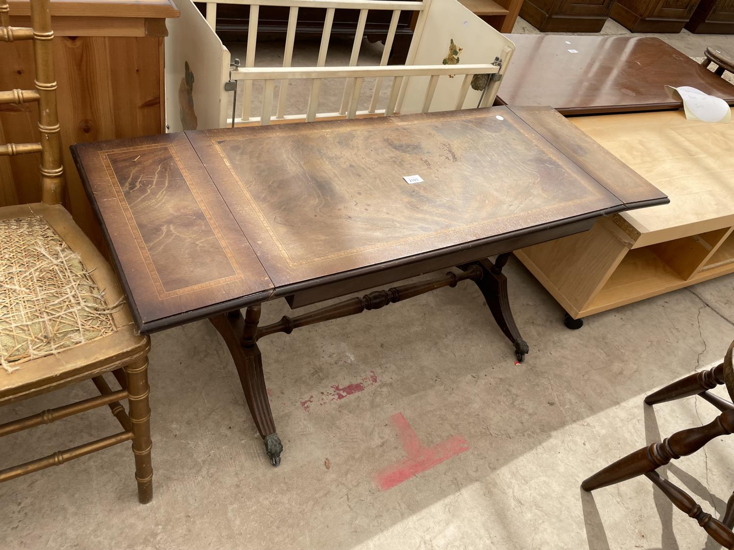 A MAHOGANY AND INLAID DROP-LEAF COFFEE TABLE