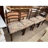 A SET OF FOUR SPANISH STYLE DINING CHAIRS WITH TURNED LEGS AND UPRIGHTS