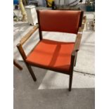 A RETRO TEAK OPEN ARMCHAIR