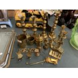 A COLLECTION OF BRASS ITEMS TO INCLUDE CANDLESTICKS, CAMEL, WELSH LADIES, KEY HOLDER ETC