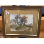 A FRAMED PICTURE OF A COUNTRY LANE SCENE