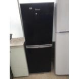 A BLACK SWAN UPRIGHT FRIDGE FREEZER