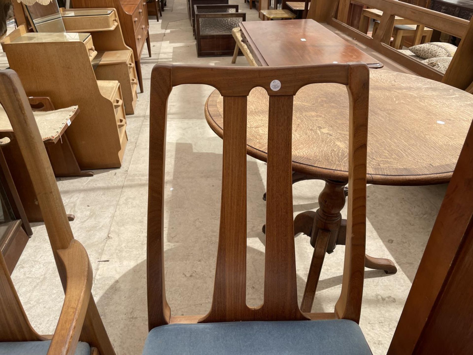 A NATHAN RETRO TEAK EXTENDING DINING TABLE WITH FOUR DINING CHAIRS AND TWO CARVERS - Image 7 of 9