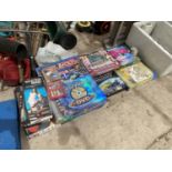 AN ASSORTMENT OF BOARD GAMES AND JIGSAWS ETC