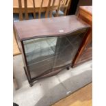 A MODERN MAHOGANY SERPENTINE FRONTED GLAZED TWO DOOR BOOKCASE ON CABRIOLE LEGS, 29" WIDE