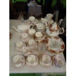 A MIXED SELECTION OF TEA SET ITEMS IN MULTIPLE FLORAL DESIGNS