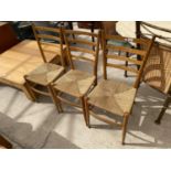 A SET OF THREE RETRO BEECH RATTAN SEATED CHAIRS WITH LADDERBACKS