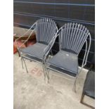 FOUR METAL FRAMED PATIO CHAIRS