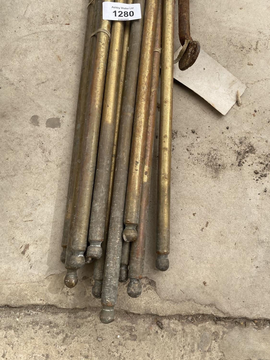 A QUANTITY OF BRASS BARS ANDD A FIRE POKER ETC - Image 2 of 4