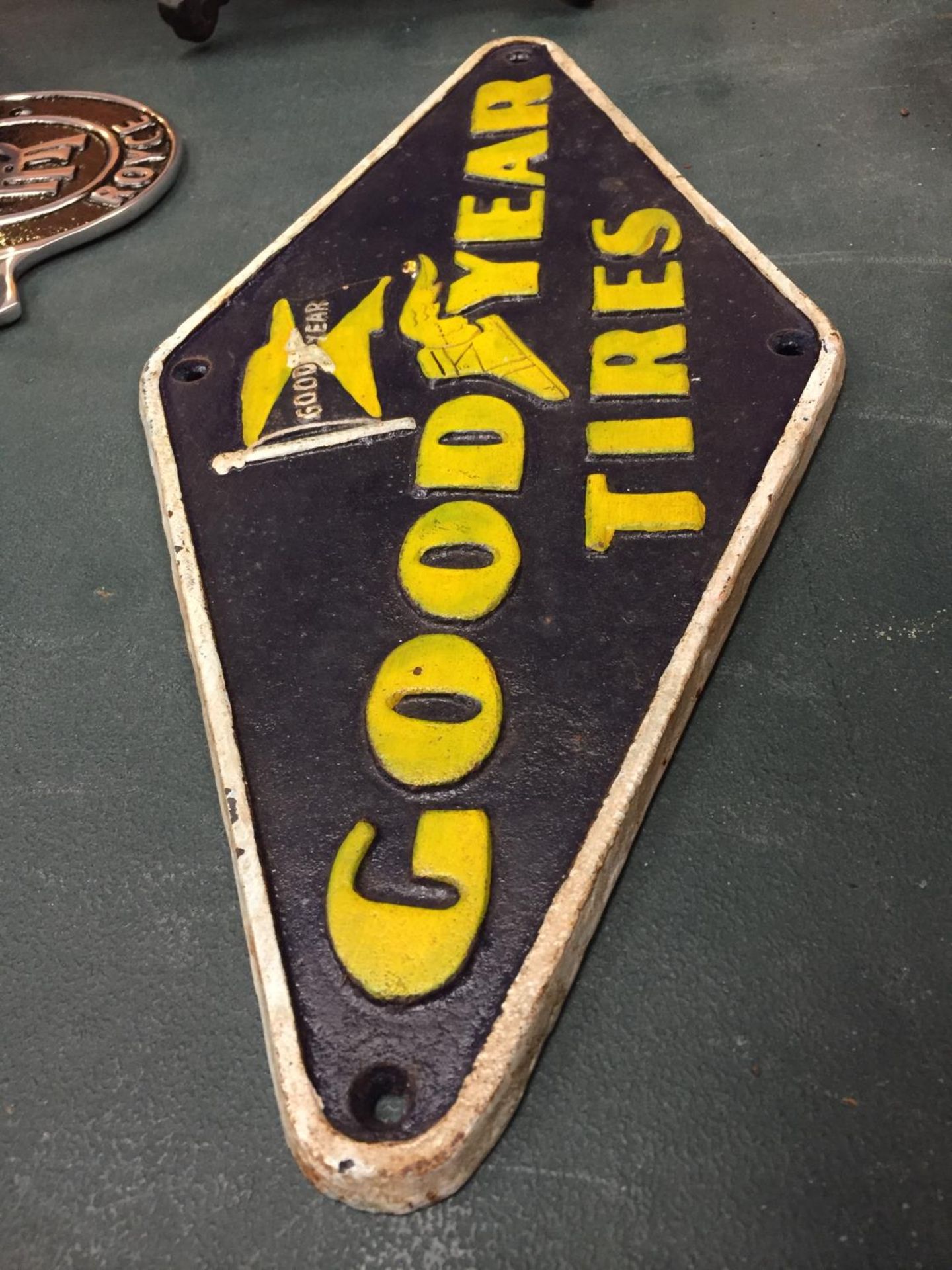 A CAST IRON GOODYEAR SIGN - Image 2 of 2