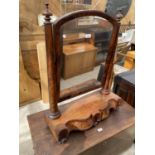 A VICTORIAN MAHOGANY SWING FRAME DRESSING MIRROR WITH TAPERING COLUMNS AND TWO DRAWERS TO THE BASE