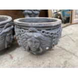 A PAIR OF STONE EFFECT PLANTERS AND A BIRD BATH