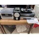 AN ASSORTMENT OF ITEMS TO INCLUDE AN LG VHS PLAYER, STEEPLETONE STEREO AND SPEAKERS ETC