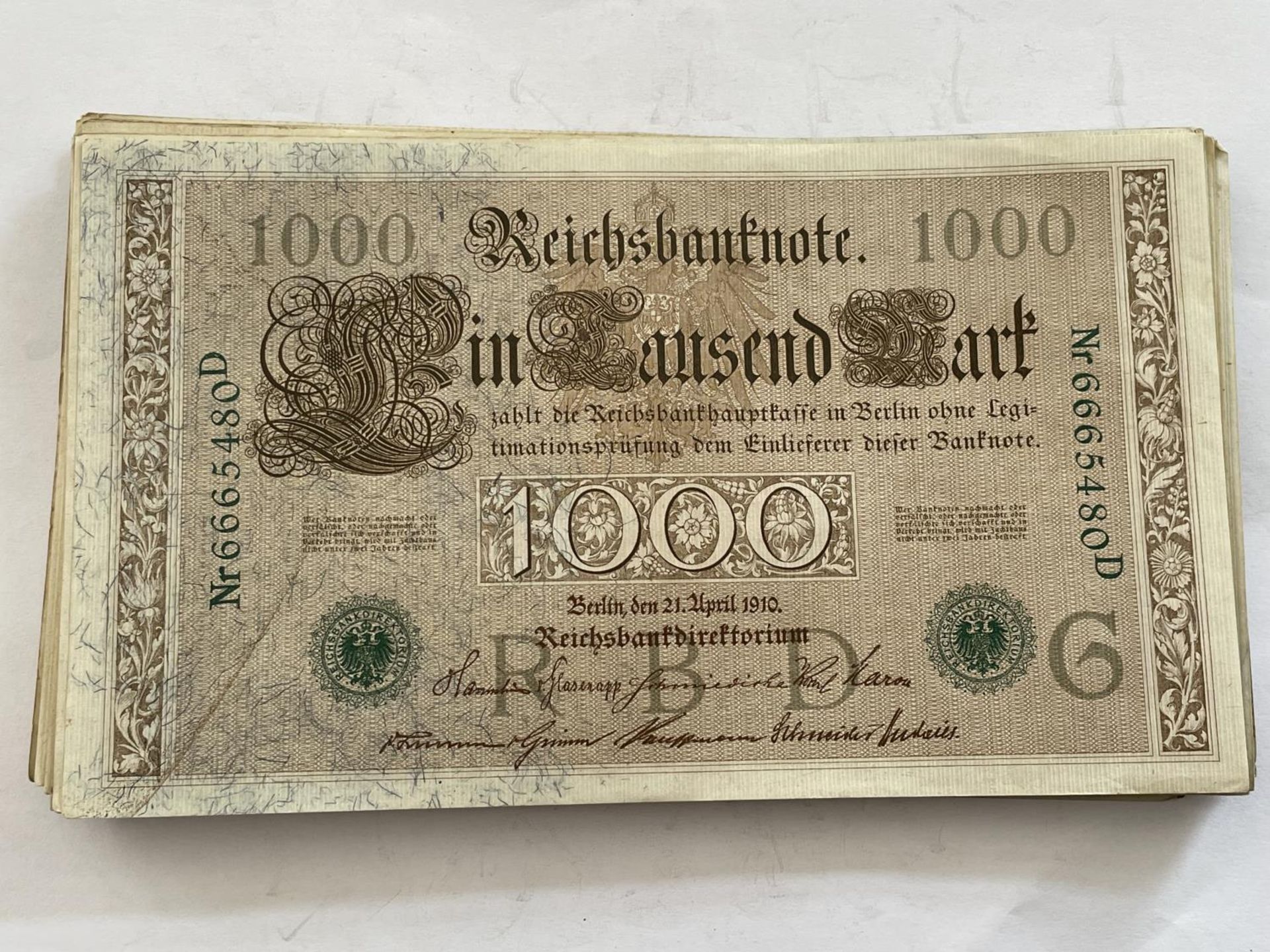 AN ENVELOPE CONTAINING A LARGE QUANTITY OF TAUSEND MARK GERMAN BANK NOTES, DATED BERLIN 21 APRIL