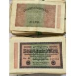 A FOLDER CONTAINING A LARGE QUANTITY OF 1923 ZWANZIGTAUSEND MARK GERMAN BANK NOTES