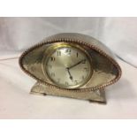 A DECO STYLE WHITE METAL MANTLE CLOCK