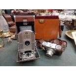 A VINTAGE POLAROID CAMERA WITH CASE AND A FURTHER PAXETTE CAMERA