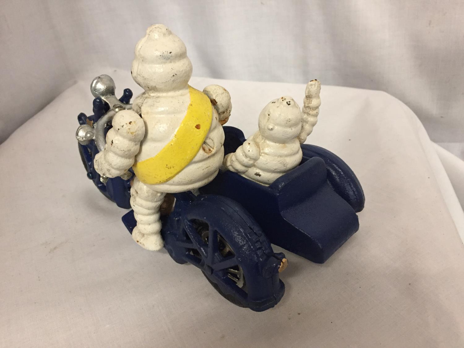 A CAST MICHELIN MAN ON A MOTOR BIKE - Image 3 of 3