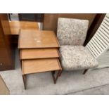A NEST OF THREE RETRO TEAK TABLES AND FLORAL BEDROOM CHAIR