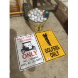 A LARGE QUANTITY OF GOLF BALLS, TWO GOLF RELATED SIGNS AND A GOLF BUCKET