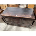 A GEORGE III OAK BLANKET CHEST WITH SHAM DRAWERS TO THE BASE, 44" WIDE, CARVING TO FRIEZE H.A. 1733