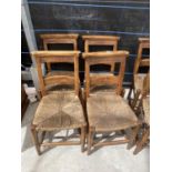 FOUR BEECH FRAMED CHAPEL CHAIRS WITH RUSH SEATS