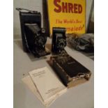 A VEST POCKET KODAK MODEL B 'AUTOGRAPHIC' IN BOX WITH INSTRUCTION MANUAL. ALSO A HOUGHTON LONDON
