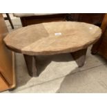 A LOW OVAL RUSTIC TABLE, 24X13"