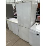 A WHITE BOSCH UPRIGHT FRIDGE FREEZER BELIEVED IN WORKING ORDER BUT NO WARRANTY