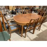 A NATHAN RETRO TEAK EXTENDING DINING TABLE WITH FOUR DINING CHAIRS AND TWO CARVERS