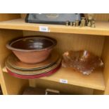 A GLAZED BOWL, A GLASS DISH AND AN ASSORTMENT OF PLASTIC CHARGERS