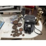 AN ASSORTMENT OF ITEMS TO INCLUDE BRASS CANDLE STICKS, WEIGHTS AND BINOCULARS ETC