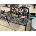 A DECORATIVE CAST METAL GARDEN BENCH